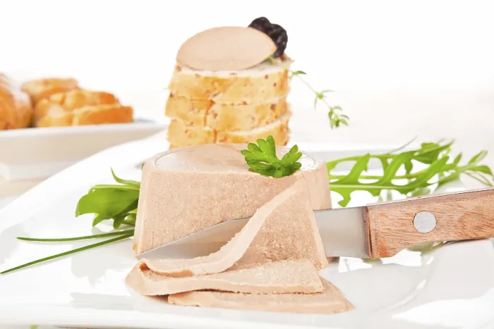 Framed Print : Delicious pate on white plate. Pastry in background