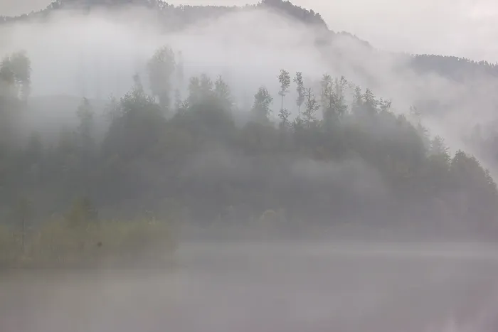 Framed Print : Dense fog on a lake on an early fall morning