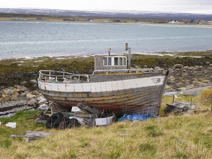 Framed Print : Derelict fishing boat on the shore of the Arctic Ocean