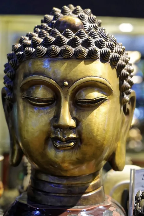 Framed Print : Detailed bronze sculpture of Buddha's head Framed Print : Detailed bronze sculpture of Buddha's head