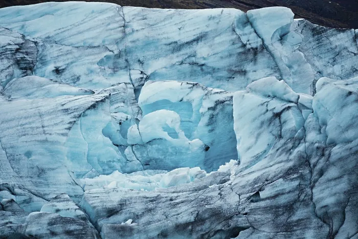 Framed Print : Detailed close-up of blue glacier ice with textured patterns Framed Print : Detailed close-up of blue glacier ice with textured patterns