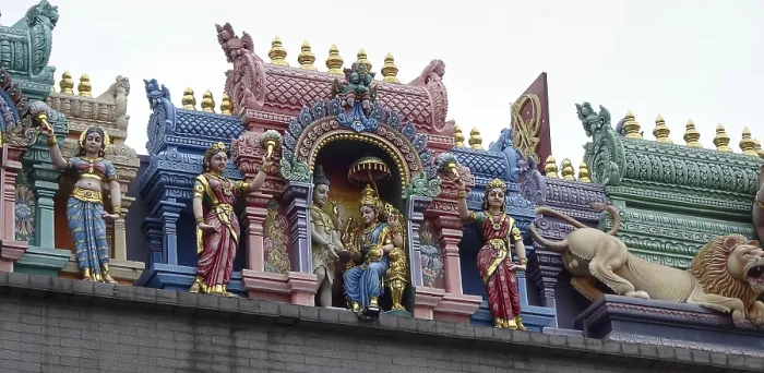 Framed Print : Detailed figures in bright colors on temple roof