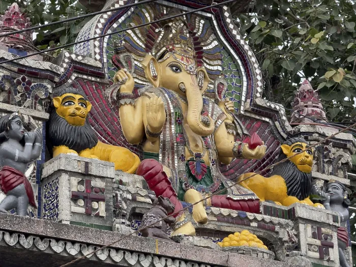 Framed Print : Detailed Ganesha statue with colourful figures and traditional design