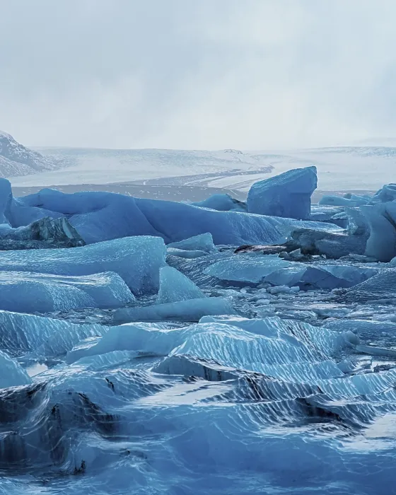 Framed Print : Detailed icy textures in a glacier field under an overcast sky