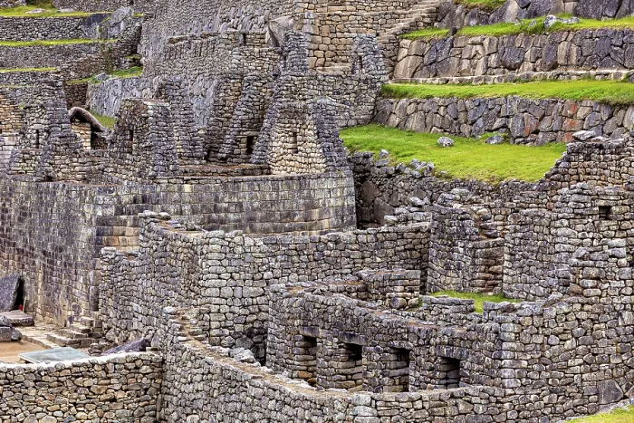 Framed Print : Detailed Inca stone structures and green terraces near Machu Picchu Framed Print : Detailed Inca stone structures and green terraces near Machu Picchu