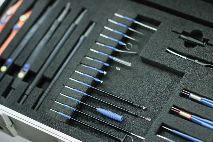 Framed Print : Detailed view of medical tools organized in a foam case