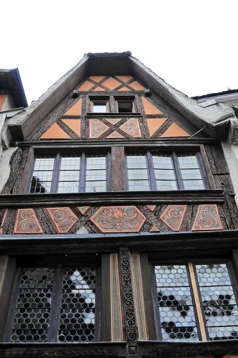 Framed Print : Detailed view of an old half-timbered house with wood carving