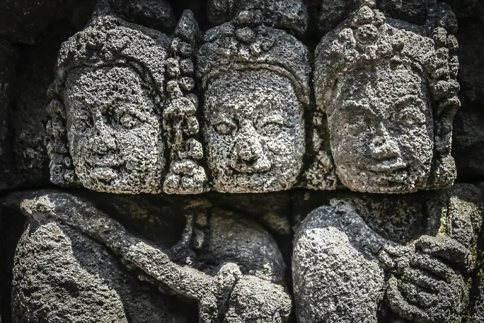 Framed Print : Details of sculptures and reliefs on the walls of the Borobudur temple in Java