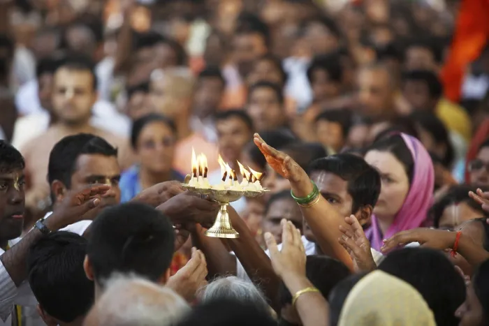 Framed Print : Devotees taking blessing after the prayers at temple in dadar