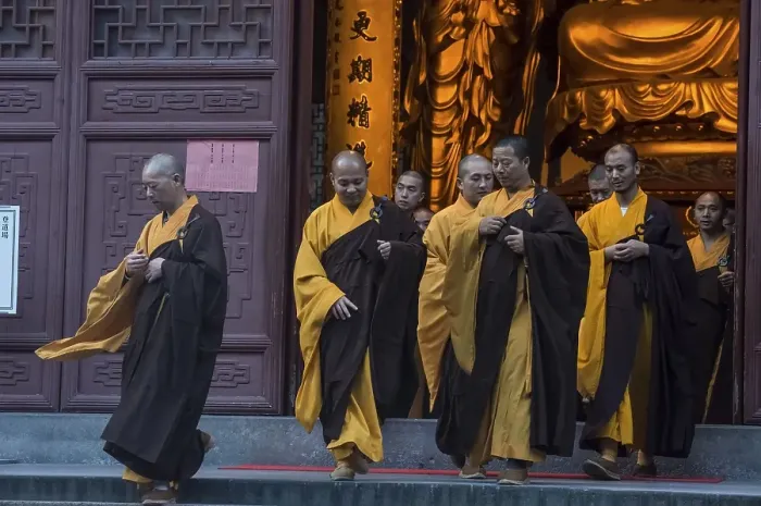 Framed Print : Devout monks leaving a temple, Lingying Monastery Framed Print : Devout monks leaving a temple, Lingying Monastery