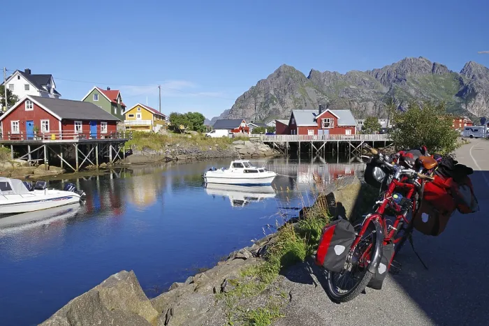 Framed Print : Different coloured hozhouses reflected in crystal clear sea water