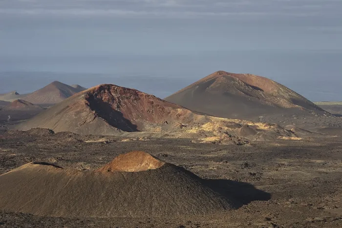 Framed Print : Different coloured volcanic cones