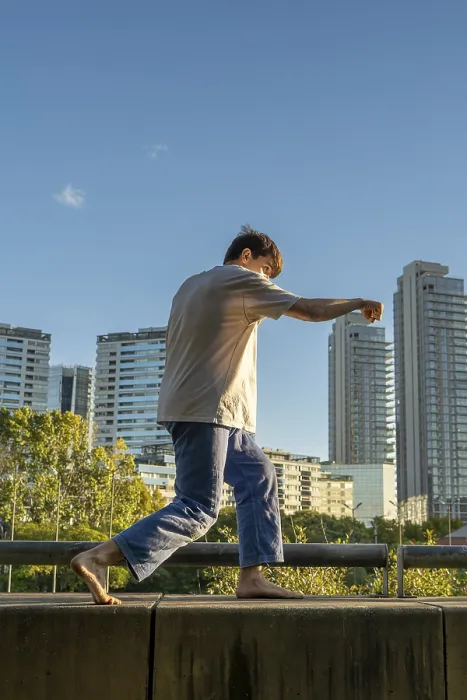 Framed Print : Discipline and precision in a solo outdoor workout in a vertical shot