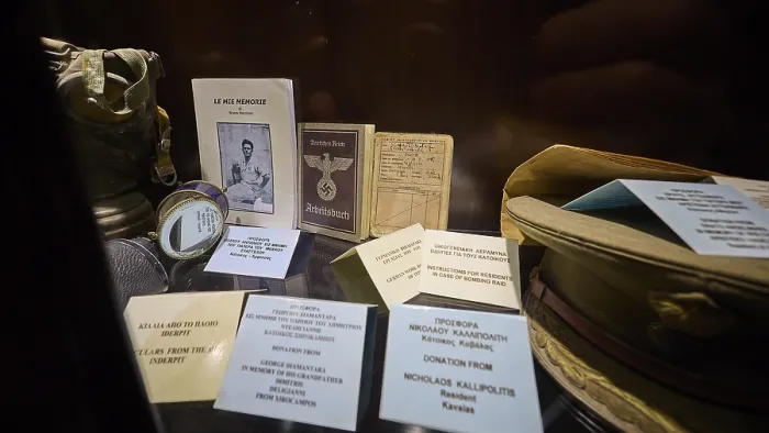 Framed Print : Display case with historical documents and memorabilia