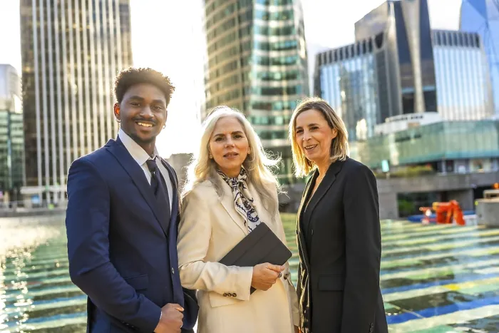 Framed Print : Diverse business team of professionals standing united and smiling Framed Print : Diverse business team of professionals standing united and smiling