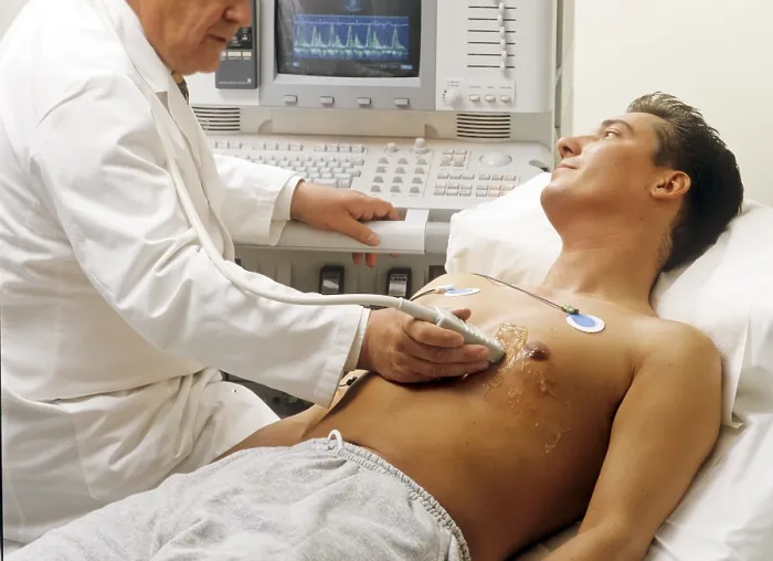 Framed Print : Doctor and patient at a ECG, electrocardiographic examination