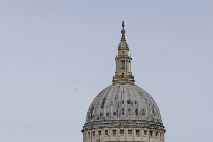 Framed Print : Dome of St. Pauls cathedral with a jet aircraft in the sky behind Framed Print : Dome of St. Pauls cathedral with a jet aircraft in the sky behind