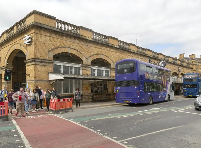 Framed Print : Double-decker buses outside York railway station building