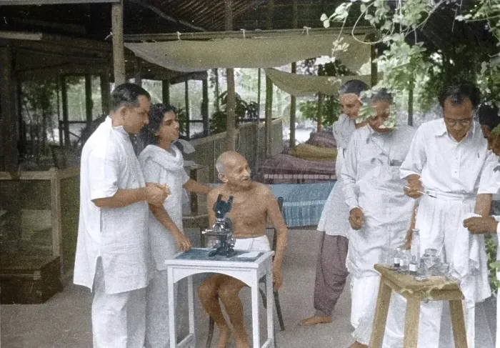 Framed Print : Dr Gajjar showing Mahatma Gandhi hookworm ova under microscope, Mumbai, India, Asia, May 1944, Asia
