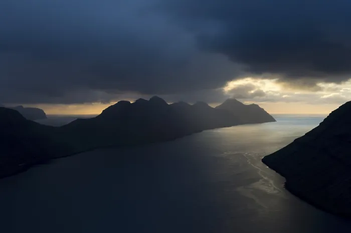 Framed Print : Dramatic mood lighting over the islands of Kalsoy and Kunoy