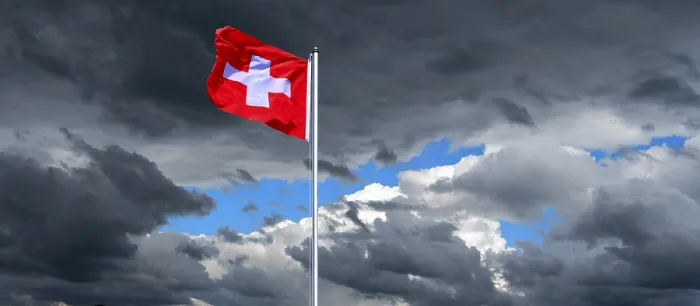 Framed Print : Dramatic sky with national flag of Switzerland in strong wind Framed Print : Dramatic sky with national flag of Switzerland in strong wind
