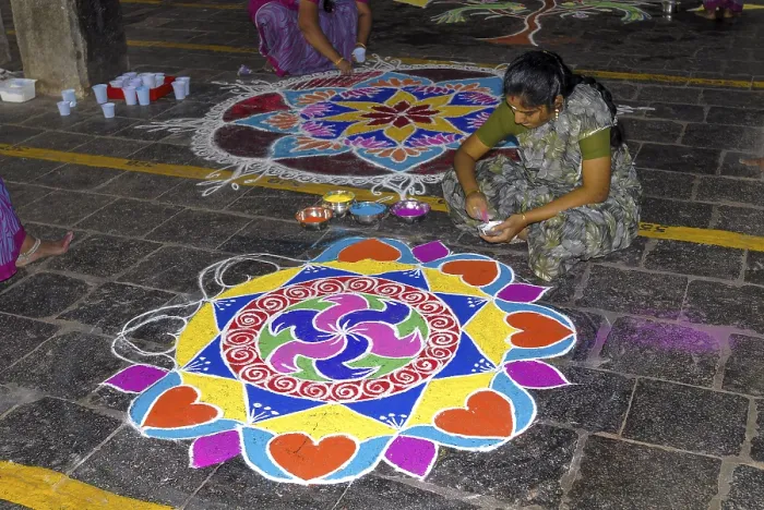 Framed Print : Drawing kolam, rangoli inside the temple floor Framed Print : Drawing kolam, rangoli inside the temple floor