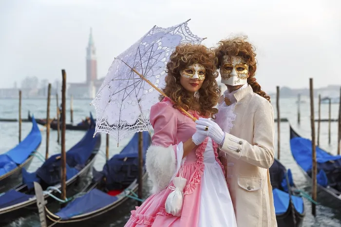 Framed Print : Dressed up couple, posing with masks and parasol Framed Print : Dressed up couple, posing with masks and parasol