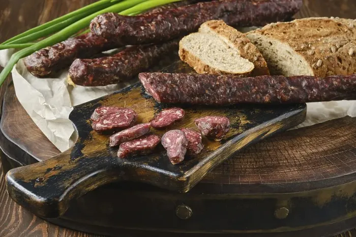 Framed Print : Dried sausage made of venison and turkey spicy meat