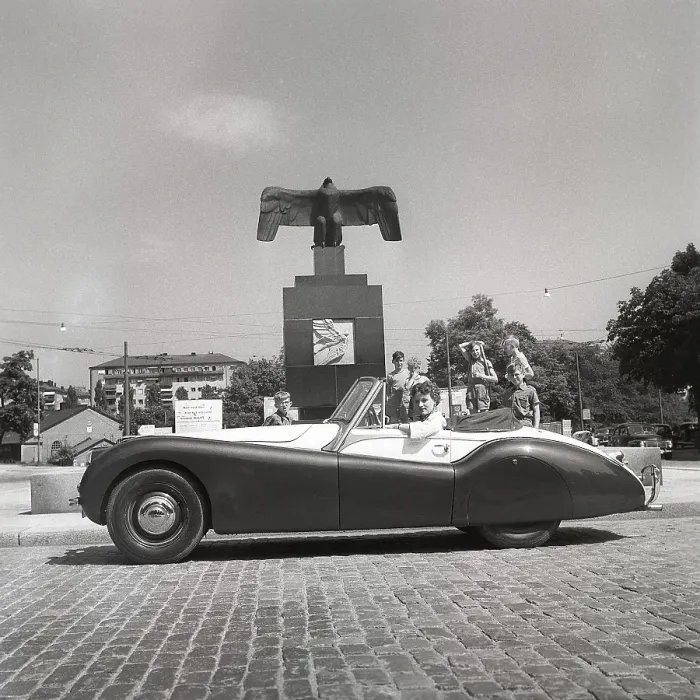 Framed Print : Driving in the 1950s. A young woman in an open convertible Jaguar XK120 Framed Print : Driving in the 1950s. A young woman in an open convertible Jaguar XK120