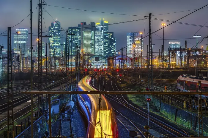 Framed Print : Driving train in front of Frankfurt am Main central station in front of the skyline