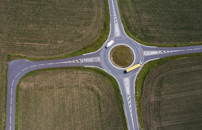 Framed Print : Drone image, roundabout with lorries between harvested fields