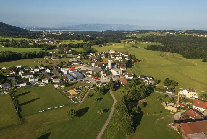 Framed Print : Drone image, view of village with parish church