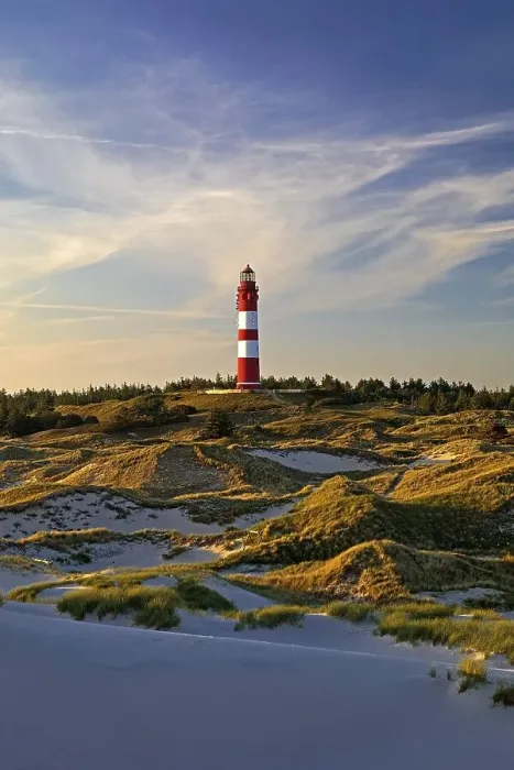 Framed Print : Dunes in the evening light with the lighthouse