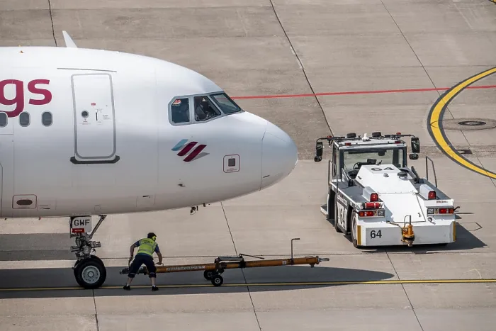 Framed Print : Dusseldorf Airport, Eurowings Airbus being towed from the gate