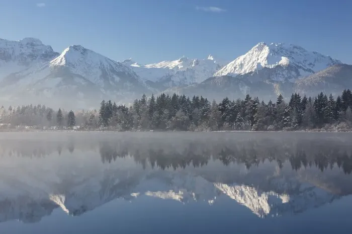 Framed Print : Early morning mist on lake Hopfensee in winter Framed Print : Early morning mist on lake Hopfensee in winter