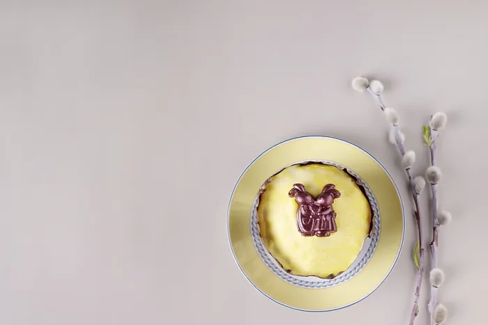 Framed Print : Easter cupcake in yellow sugar icing with chocolate hare Framed Print : Easter cupcake in yellow sugar icing with chocolate hare