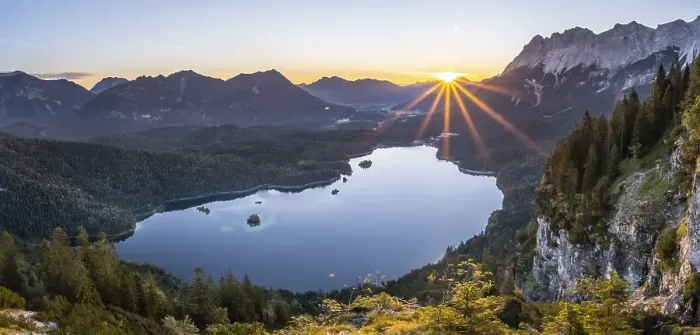 Framed Print : Eibsee lake at sunrise, sun shining over Bavarian alpine foothills