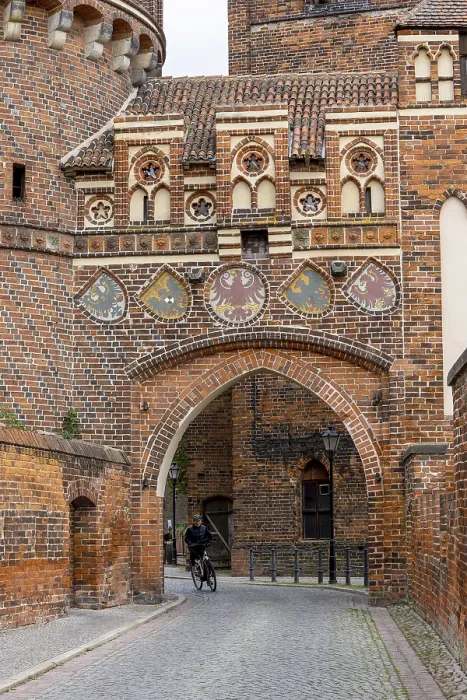 Framed Print : Elaborately made of red brick and decorated with various coats of arms Framed Print : Elaborately made of red brick and decorated with various coats of arms