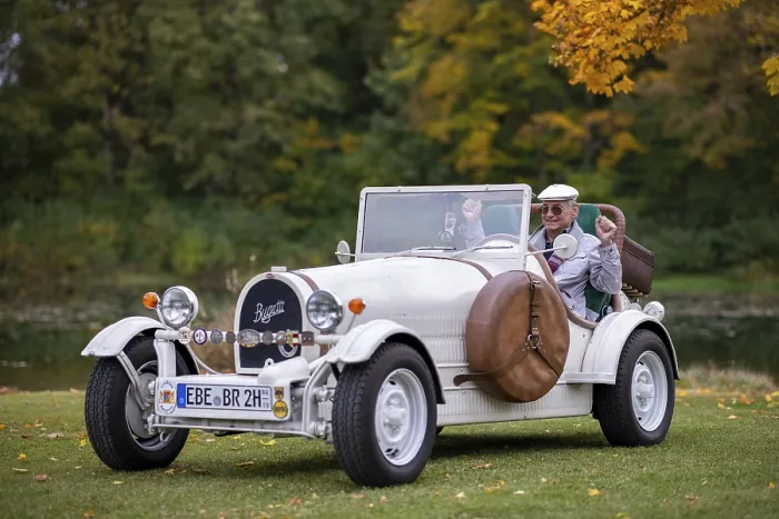 Framed Print : An elderly gentleman sitting in his replica of a 1923 Bugatti 35 B Framed Print : An elderly gentleman sitting in his replica of a 1923 Bugatti 35 B
