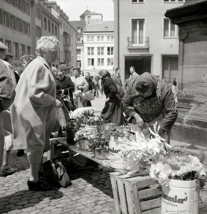 Framed Print : Elderly lady buys a bouquet of flowers