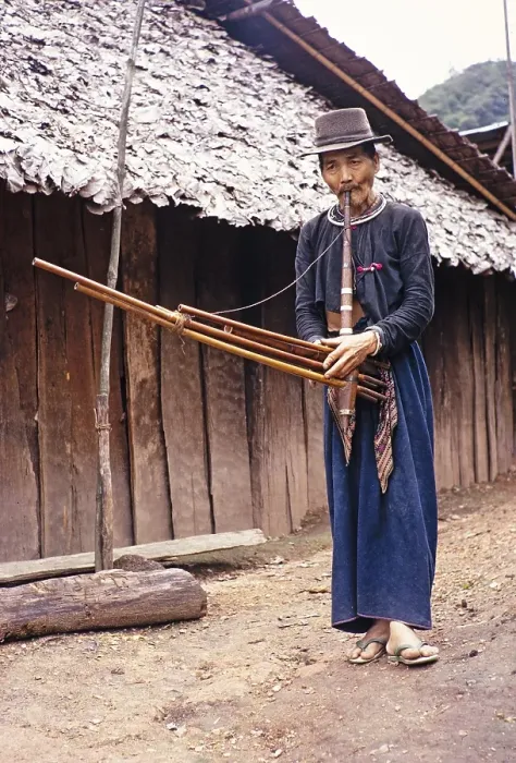 Framed Print : Elderly Laotian man playing a musical instrument, Northern Thailand, Asia 1971 Framed Print : Elderly Laotian man playing a musical instrument, Northern Thailand, Asia 1971