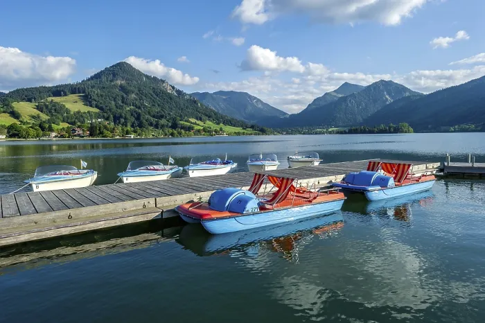 Framed Print : Electric boats and pedal boats at jetty