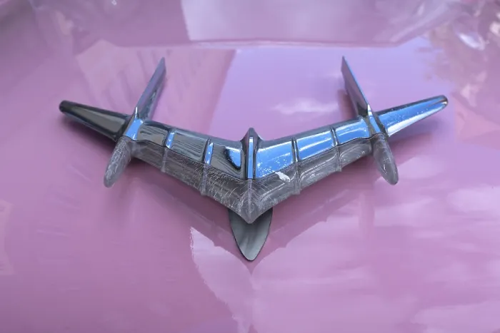 Framed Print : Emblem, hood figure on the pink Pontiac