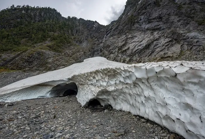 Framed Print : Entrance of an ice cave of a glacier