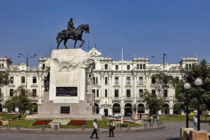 Framed Print : Equestrian statue on a large pedestal in front of an imposing historic building under a blue sky Framed Print : Equestrian statue on a large pedestal in front of an imposing historic building under a blue sky