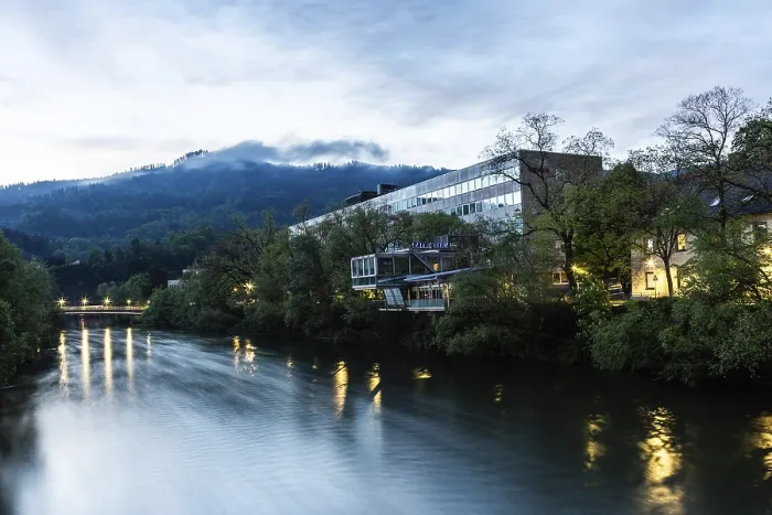 Framed Print : Evening mood, fog over hills, town hall of Leoben at the river Mur