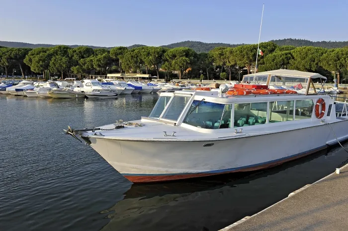 Framed Print : Excursion boat, motorboat and yachts in the marina of Bolsena Framed Print : Excursion boat, motorboat and yachts in the marina of Bolsena