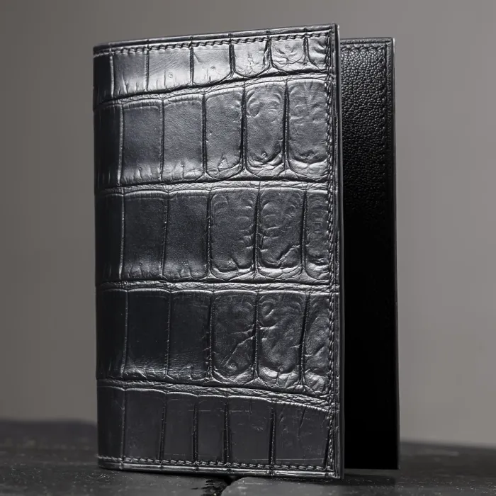 Framed Print : Expensive elite purse made of crocodile skin on a grey background Framed Print : Expensive elite purse made of crocodile skin on a grey background