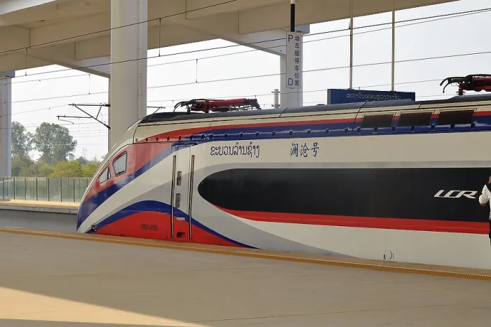 Framed Print : Express train of the Laos-China Railway LCR at the platform of the modern railway station of Vientiane Framed Print : Express train of the Laos-China Railway LCR at the platform of the modern railway station of Vientiane