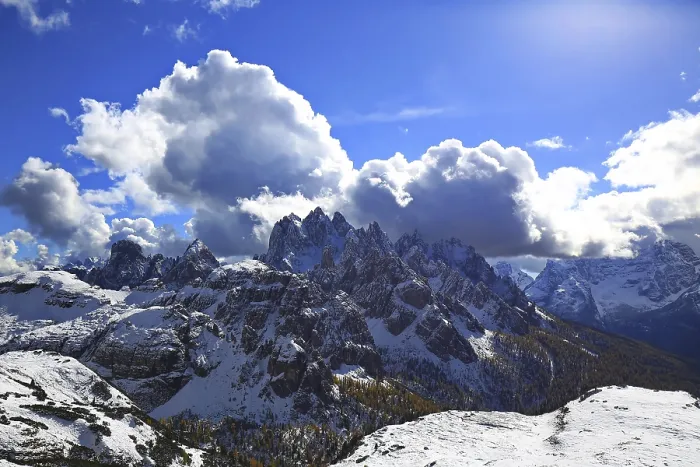 Framed Print : Extensive panorama of the Three Peaks with dramatic clouds and sunshine
